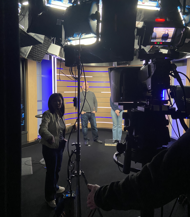 Behind-the-scenes view of Azure Cosmos DB Conf 2025 studio with lights, crew, and cameras