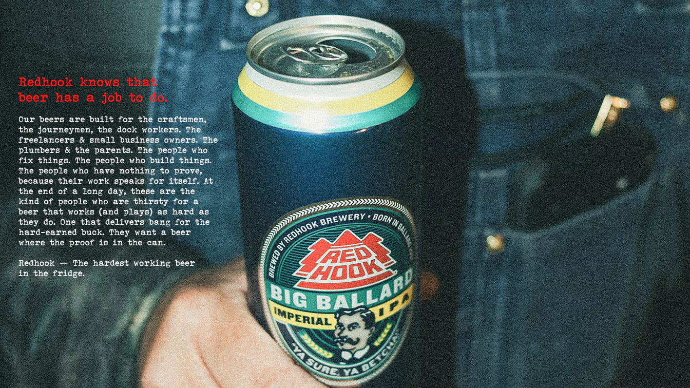 Close-up of a Redhook Big Ballard Imperial IPA can with text about hard-working beer drinkers overlayed.